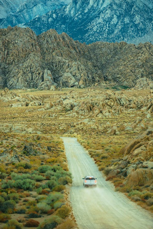 White Vehicle on Dirt Road