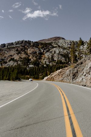 Winding road through a rocky landscape, photo by Wendy Wei on Pexels