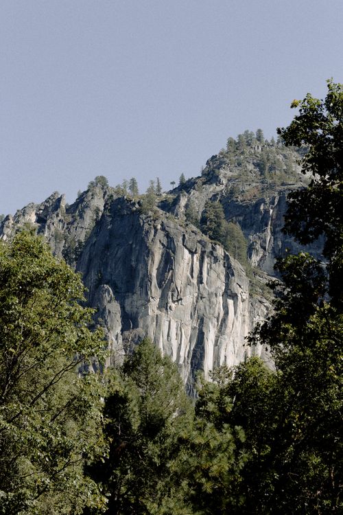 Free Scenic view of forested mountains under a clear sky, perfect for nature lovers. Stock Photo