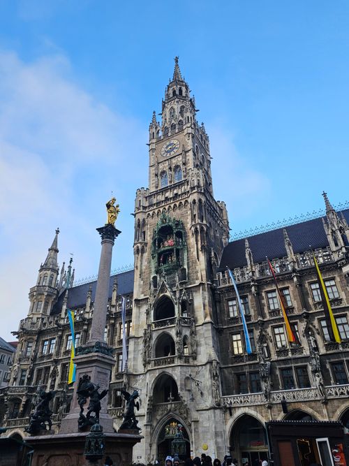 Free Stunning view of Munich's Neues Rathaus showcasing Gothic architecture under clear blue skies. Stock Photo