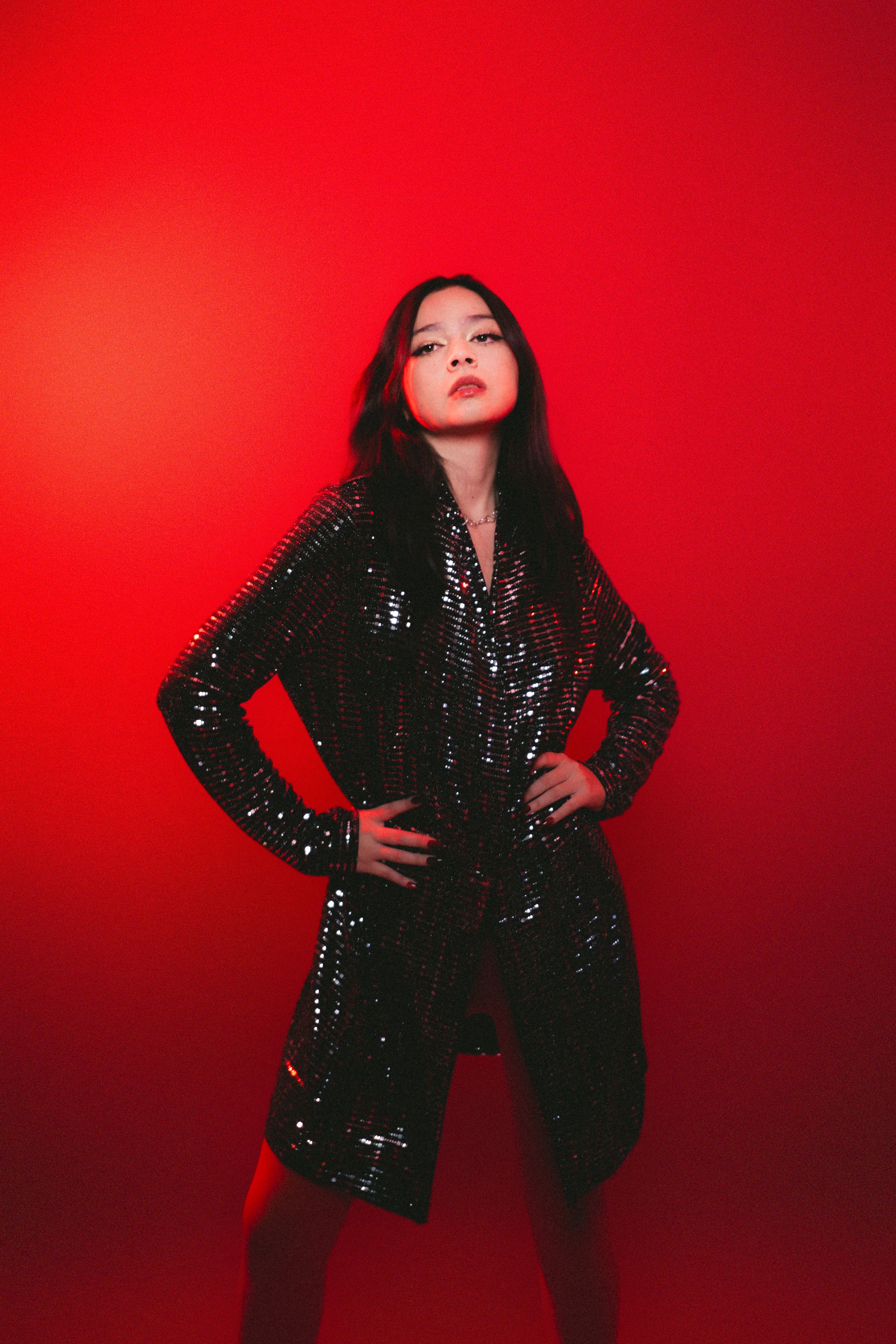 Bold Portrait of Woman in Sequin Dress · Free Stock Photo