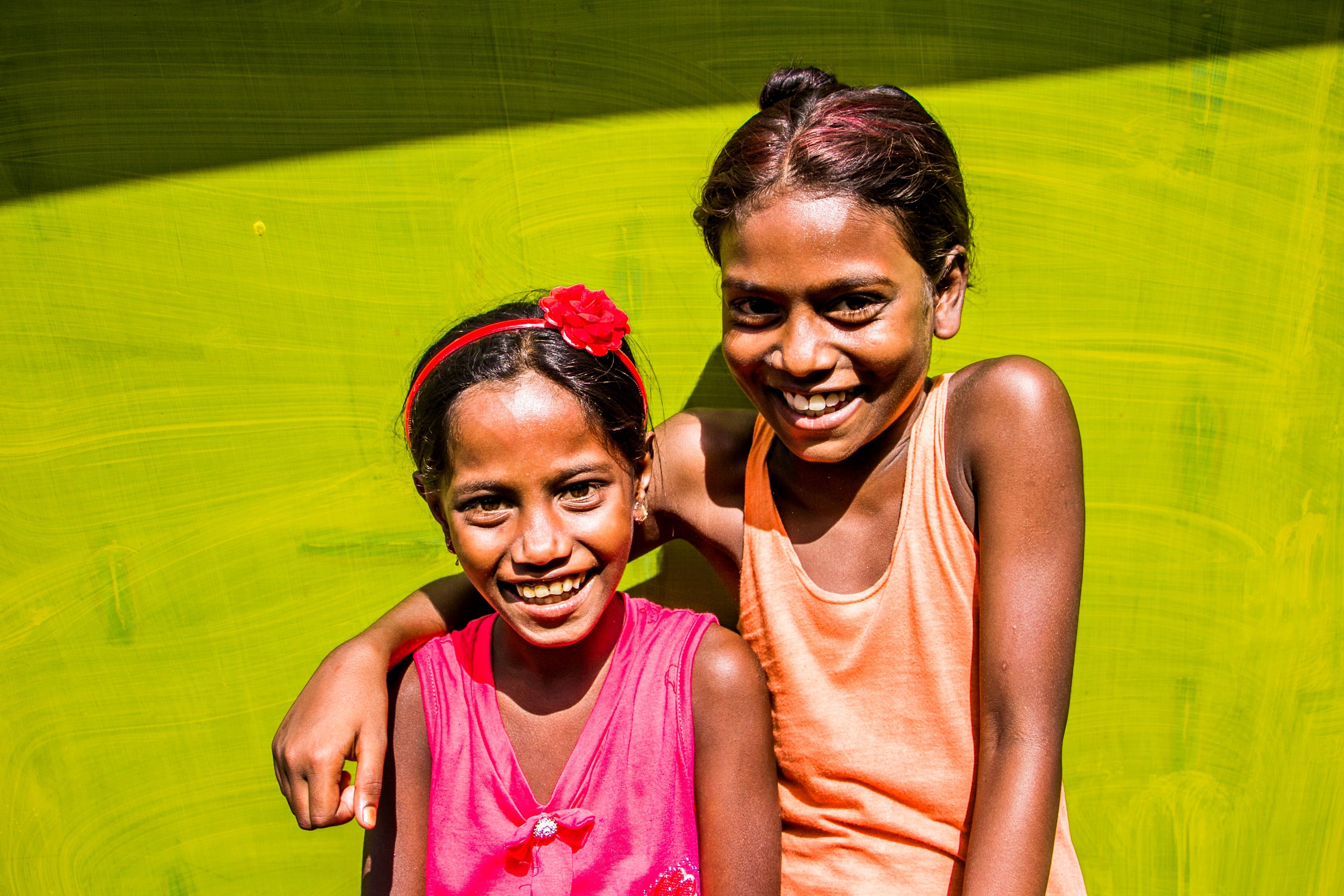 Joyful Portrait of Two Smiling Girls · Free Stock Photo