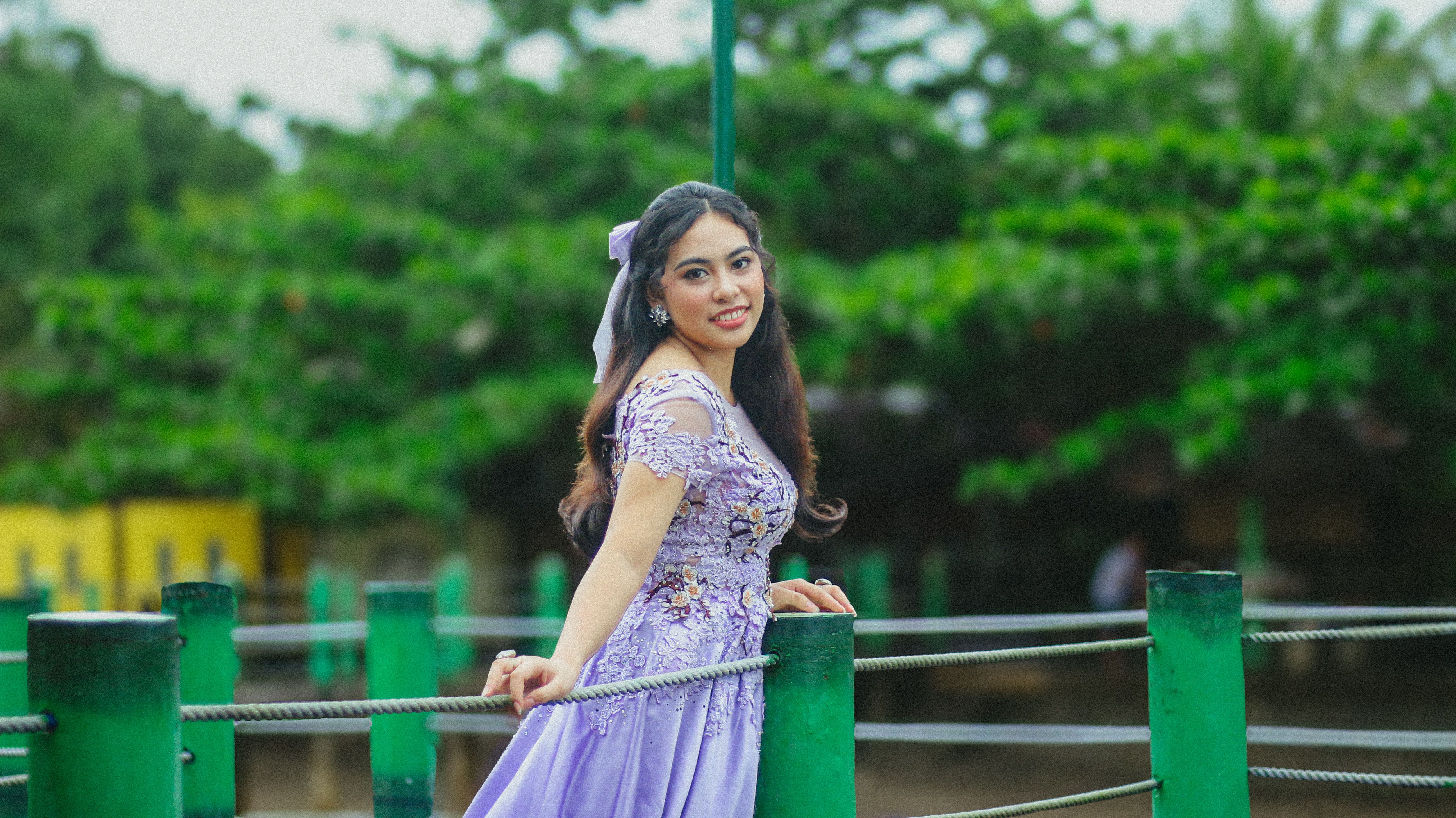 Elegant Woman in Lavender Dress Outdoors · Free Stock Photo