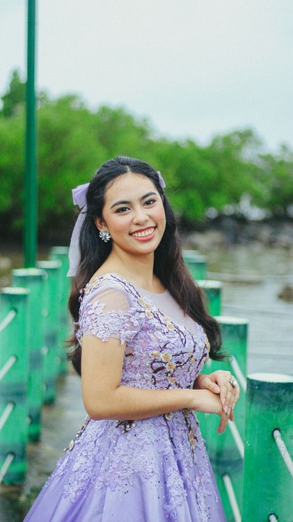 Elegant Woman in Lavender Dress Outdoors · Free Stock Photo