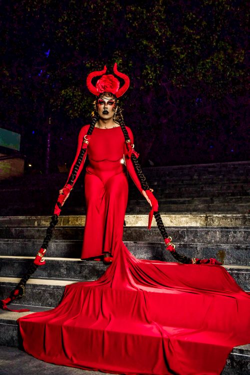 Person In Red Striking Portrait of a Fashionable Person in Red Costume · Free Stock Photo