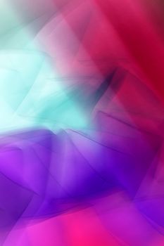 A vibrant abstract background featuring a blend of red, purple, and teal light patterns.