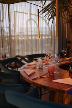 A sophisticated restaurant setting with stylish decor and elegant table settings.