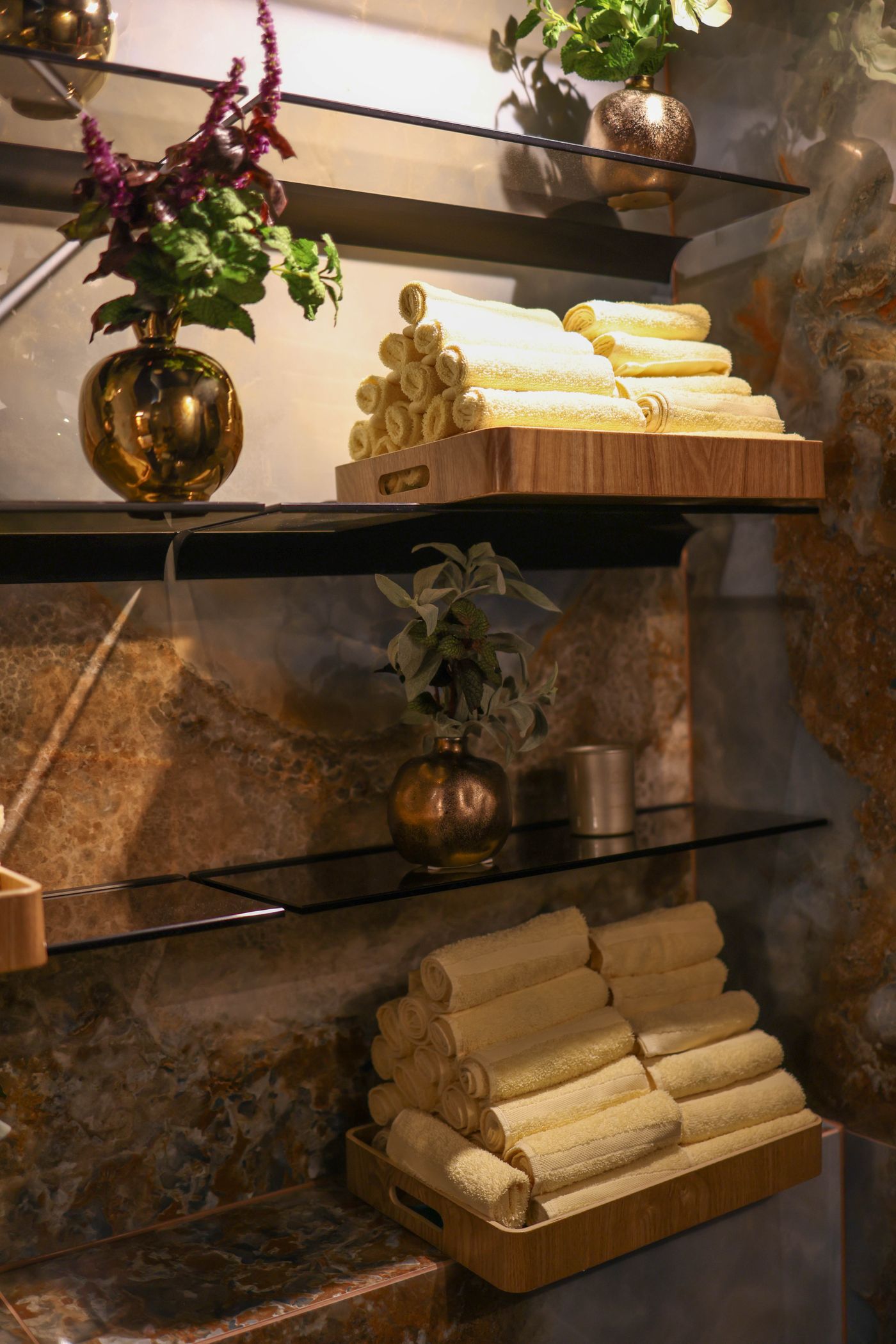 Elegant wellness interior with towels and natural textures