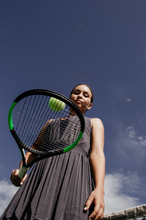 Woman Tossing Ball