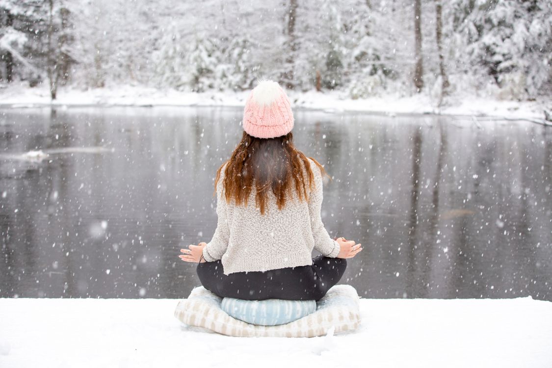 Meditative Winter Scene by Snowy Lake · Free Stock Photo