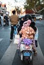 Mother and Child on Electric Bike in Nanjing