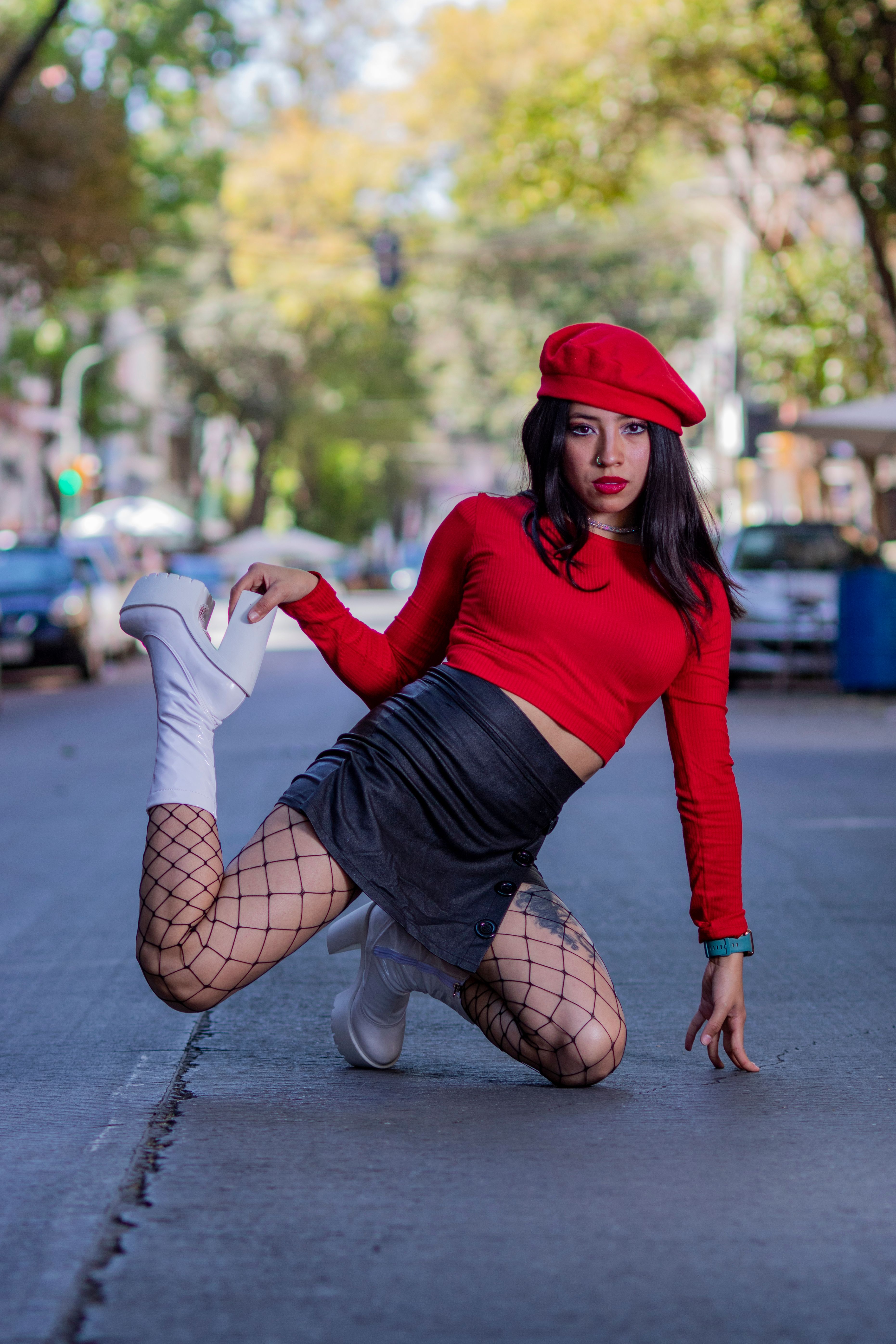 Stylish woman posing in urban street setting · Free Stock Photo