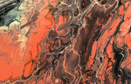 Dynamic abstract art with orange and black swirling acrylic patterns.