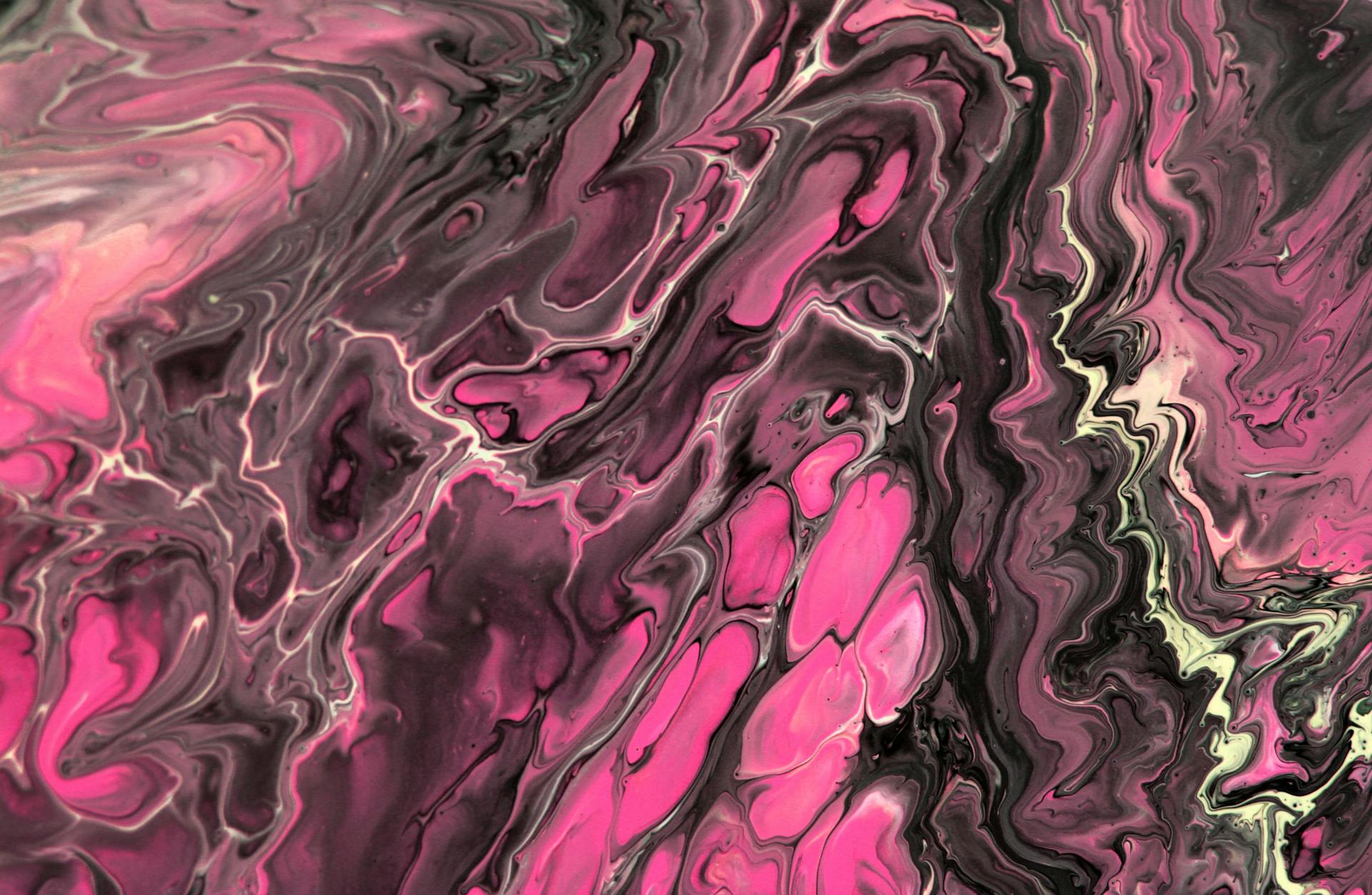 Stunning abstract artwork showcasing pink and black swirl patterns resembling marble texture.