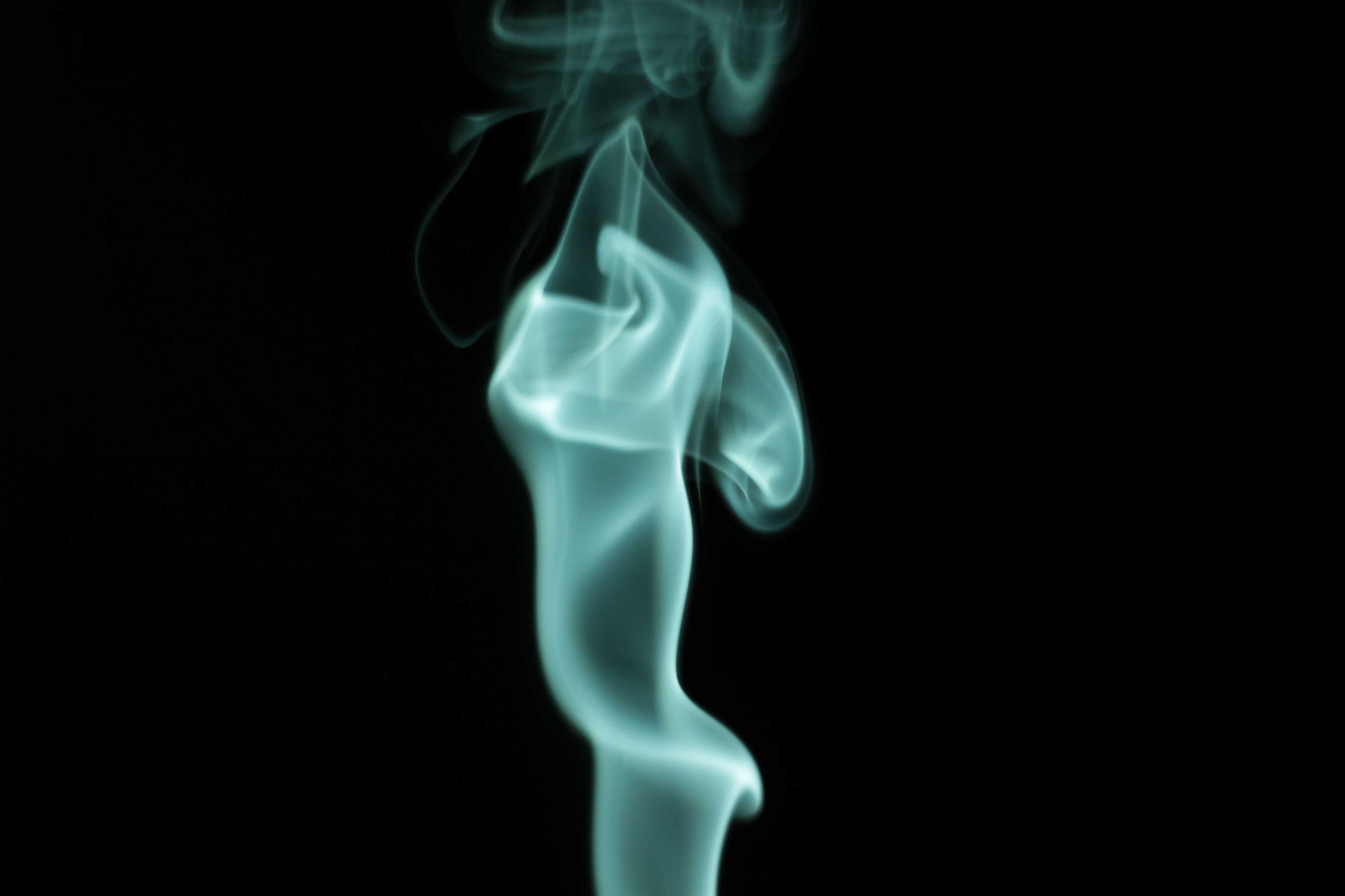 Abstract Smoke Swirl on Black Background