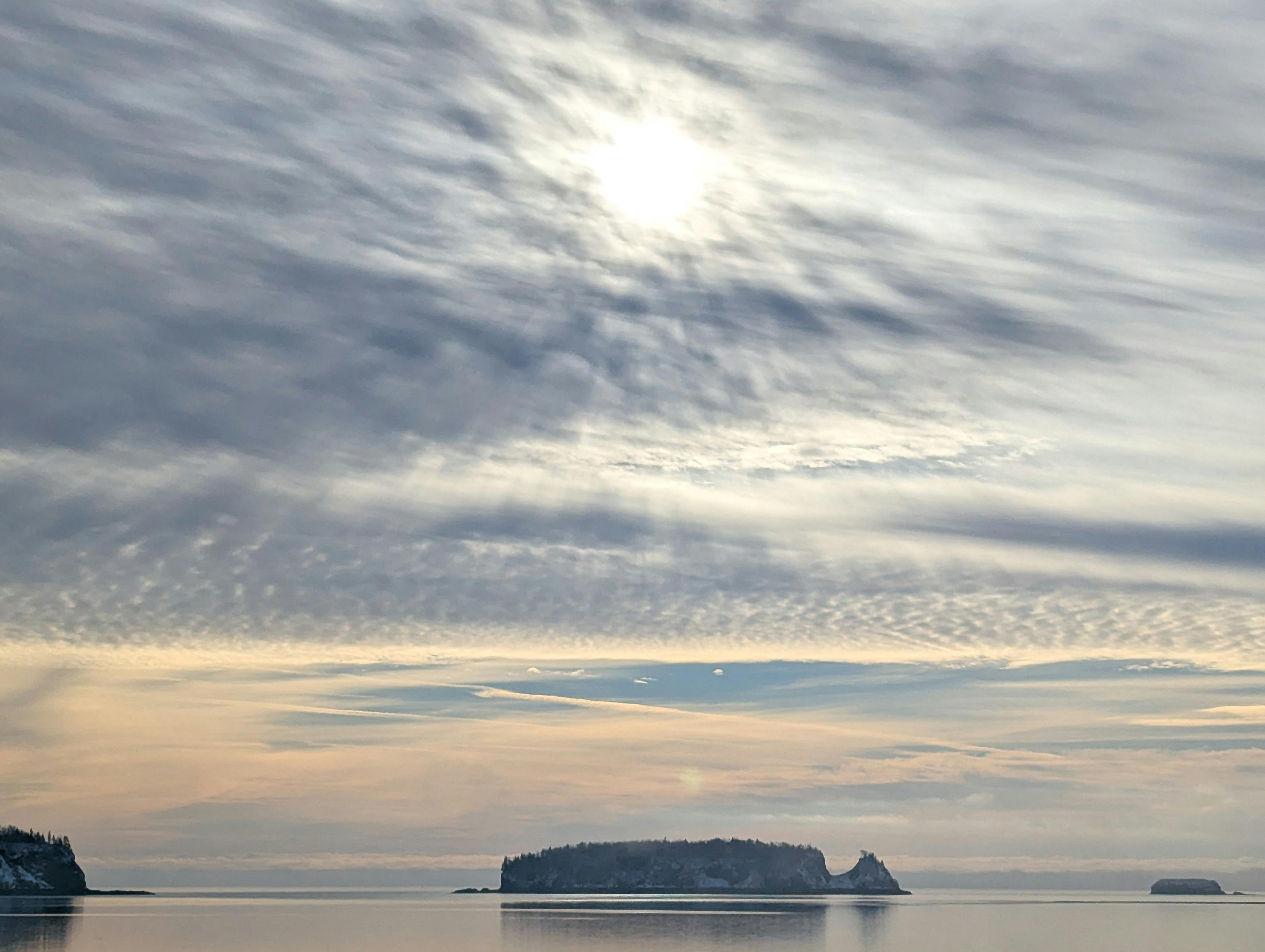 serene winter sunrise over foggy canadian coast