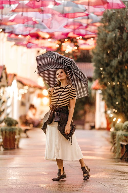 Woman Holding Umbrella