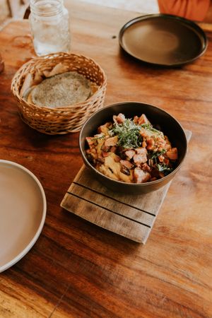 Home cooked bowl of food on a table. Photo by Amar Preciado on Pexels.