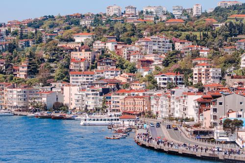 Free Scenic view of Istanbul's colorful waterfront along the Bosphorus with bustling streets and diverse architecture. Stock Photo