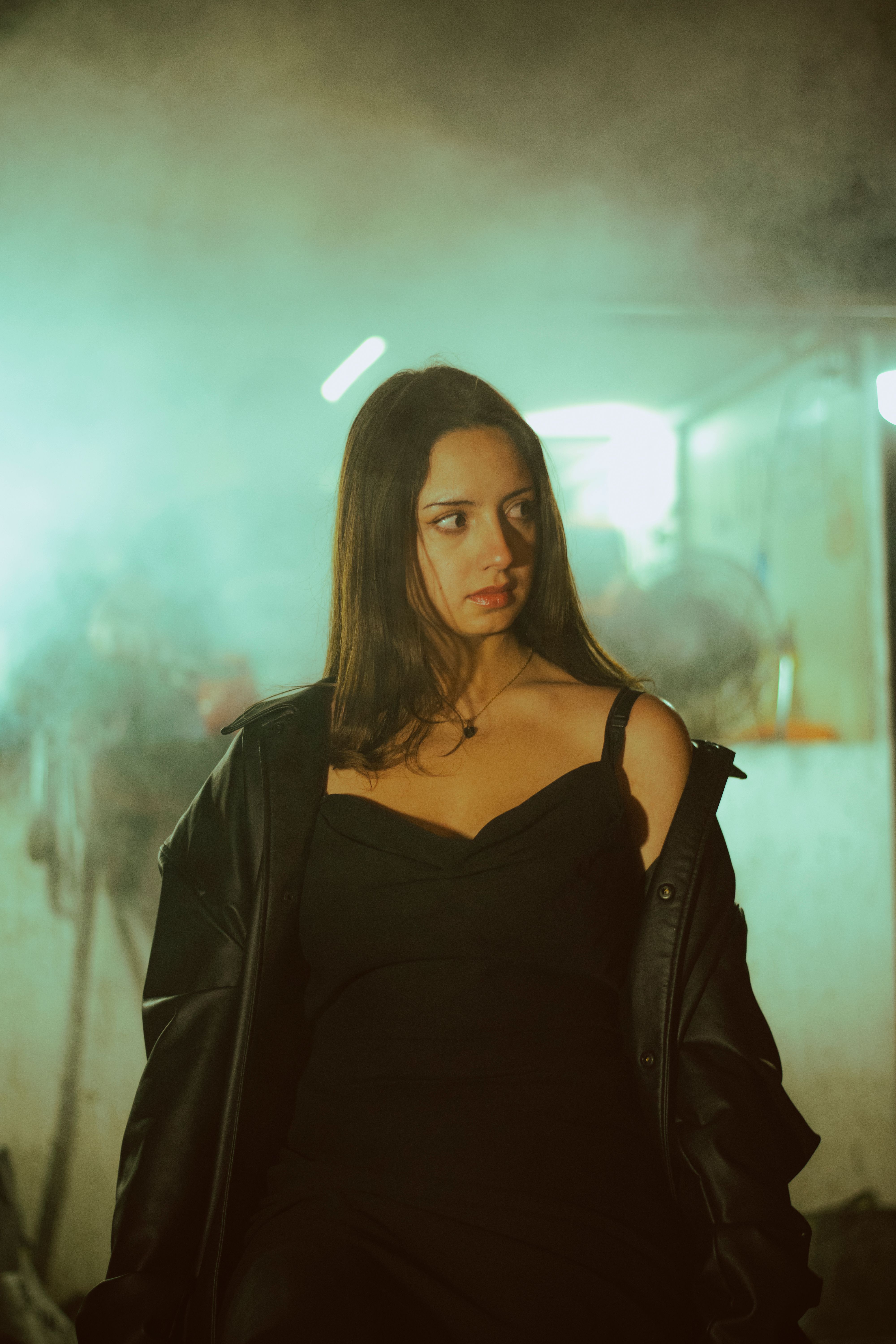 Moody Portrait of a Woman in Smoky Atmosphere  Free Stock Photo