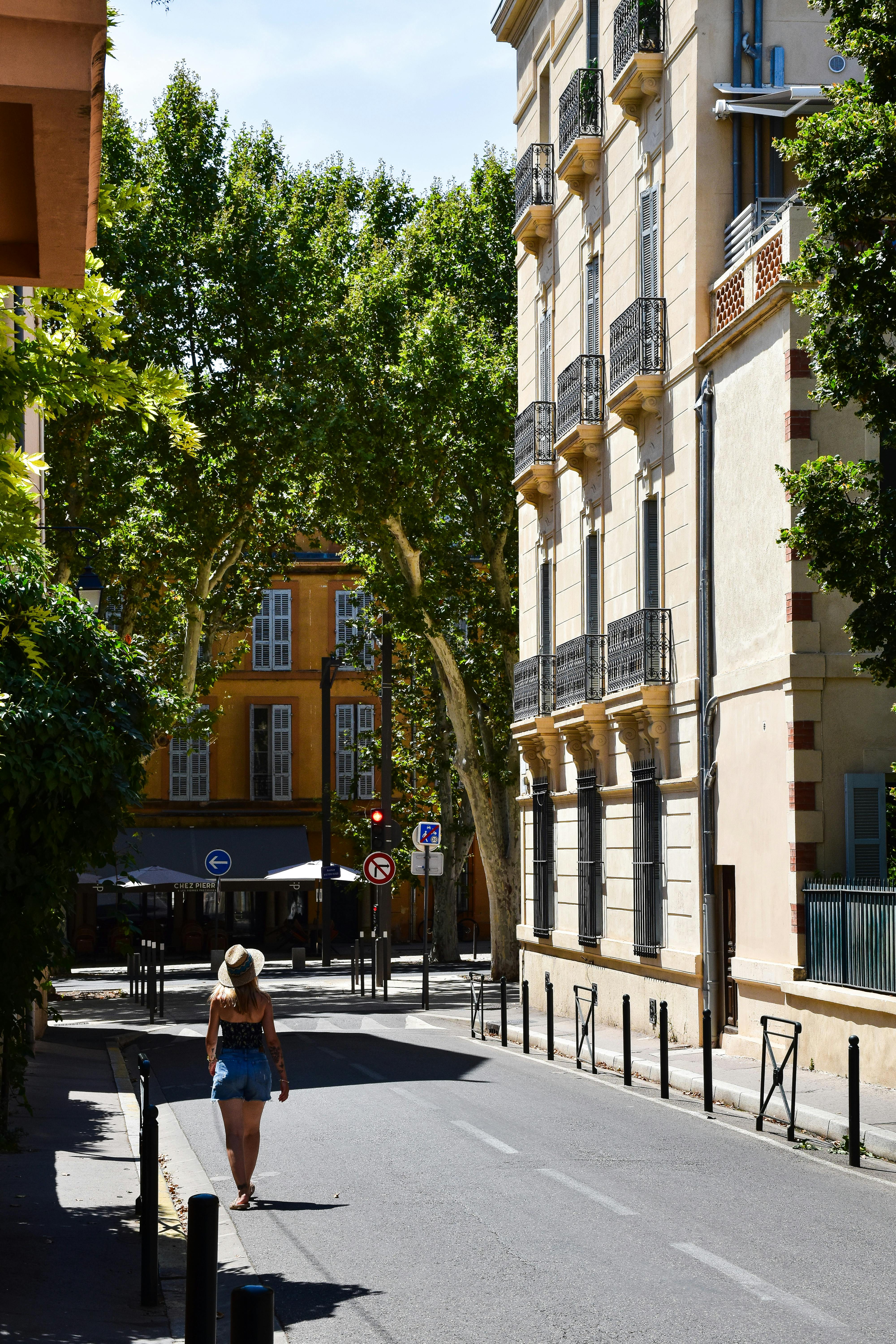 A peaceful summer day on a charming street in Aix-en-Provence, France.