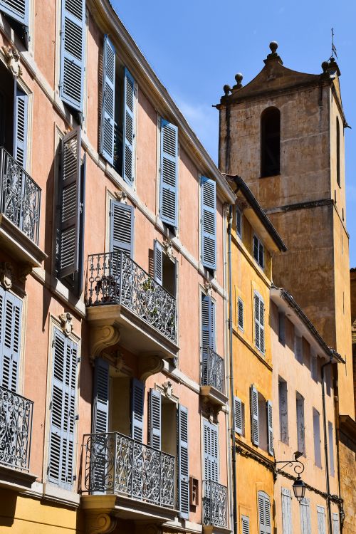 Free Colorful buildings with shutters in Aix-en-Provence, highlighting French architecture. Stock Photo