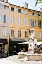 Charming Aix-en-Provence Street with Historic Fountain