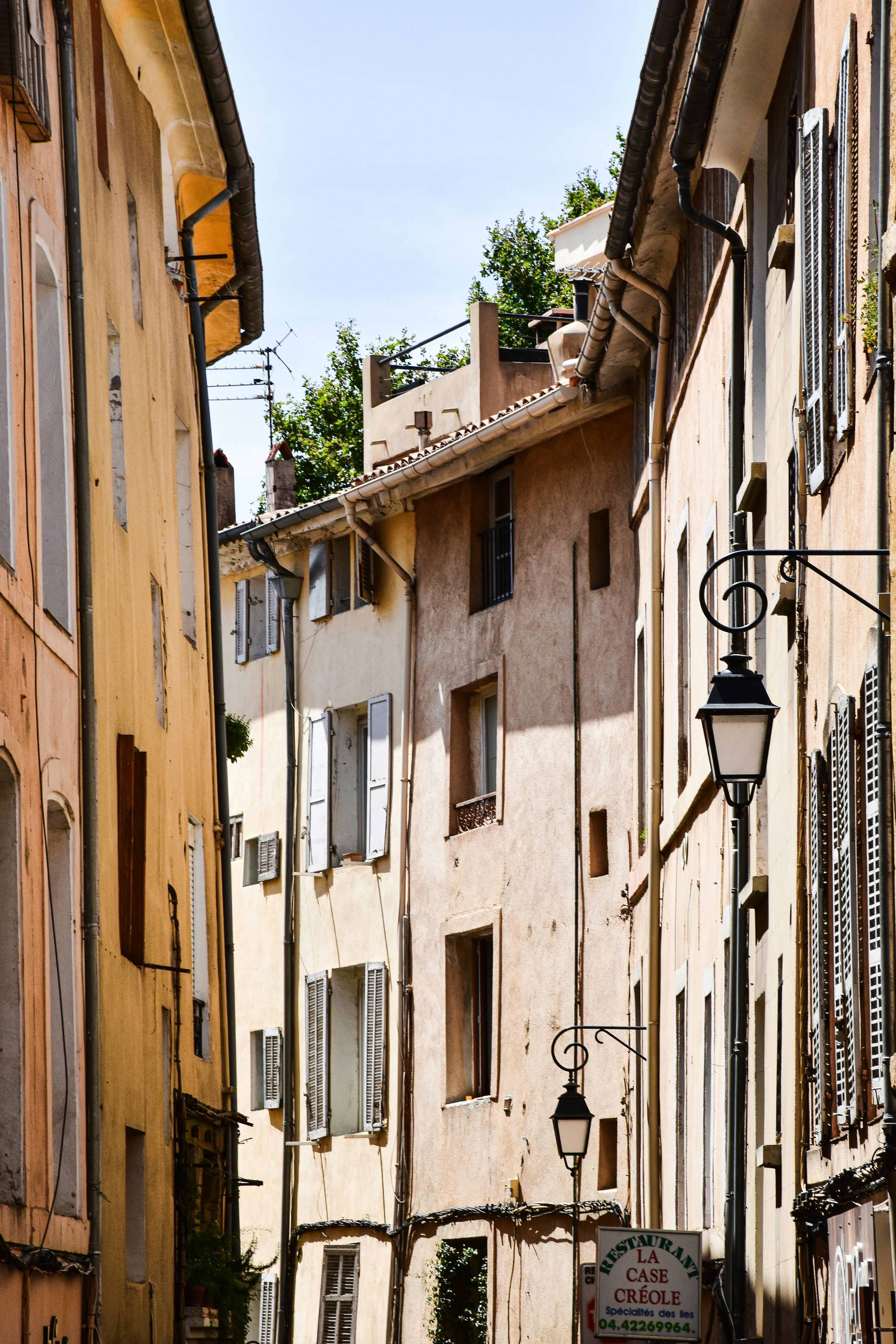Discover the picturesque architecture and quaint narrow streets of Aix-en-Provence, France.