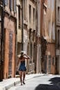 Woman Walking in Aix-en-Provence Street