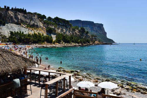 Free Beautiful beach scene at Cassis with clear waters and cliffs in the French Riviera. Stock Photo