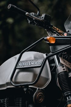 Moody close-up of a Royal Enfield Himalayan motorcycle, perfect for adventure and travel enthusiasts.