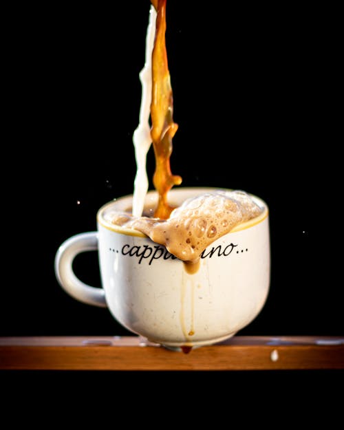 Free Coffee Poured in White Cup Stock Photo