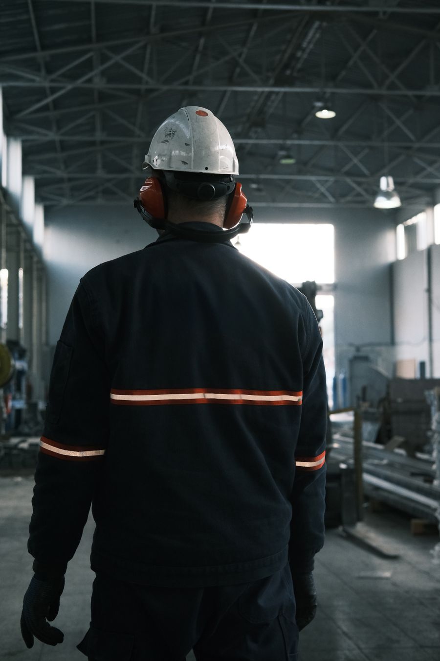 NexoFab worker in a modern factory