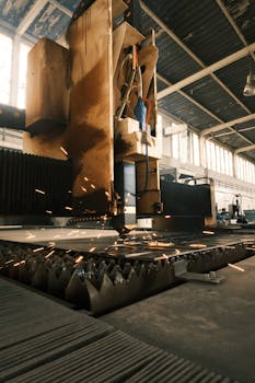 High-tech laser cutter operating in a modern industrial environment.