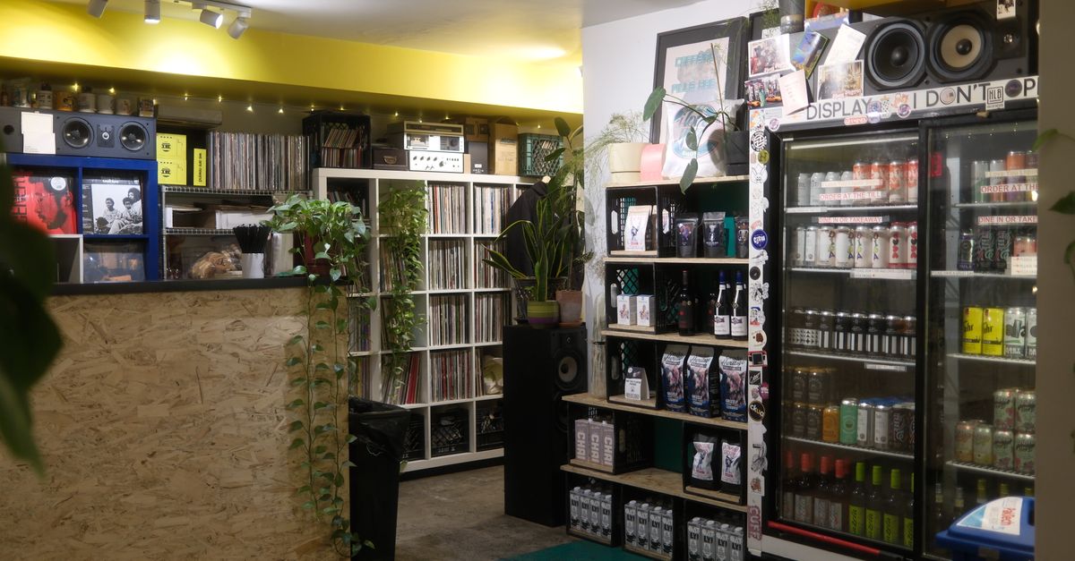 Cozy Record Shop with Vinyl and Beverages Display Free Stock Photo Cozy Record Shop with Vinyl and Beverages Display Free Stock Photo