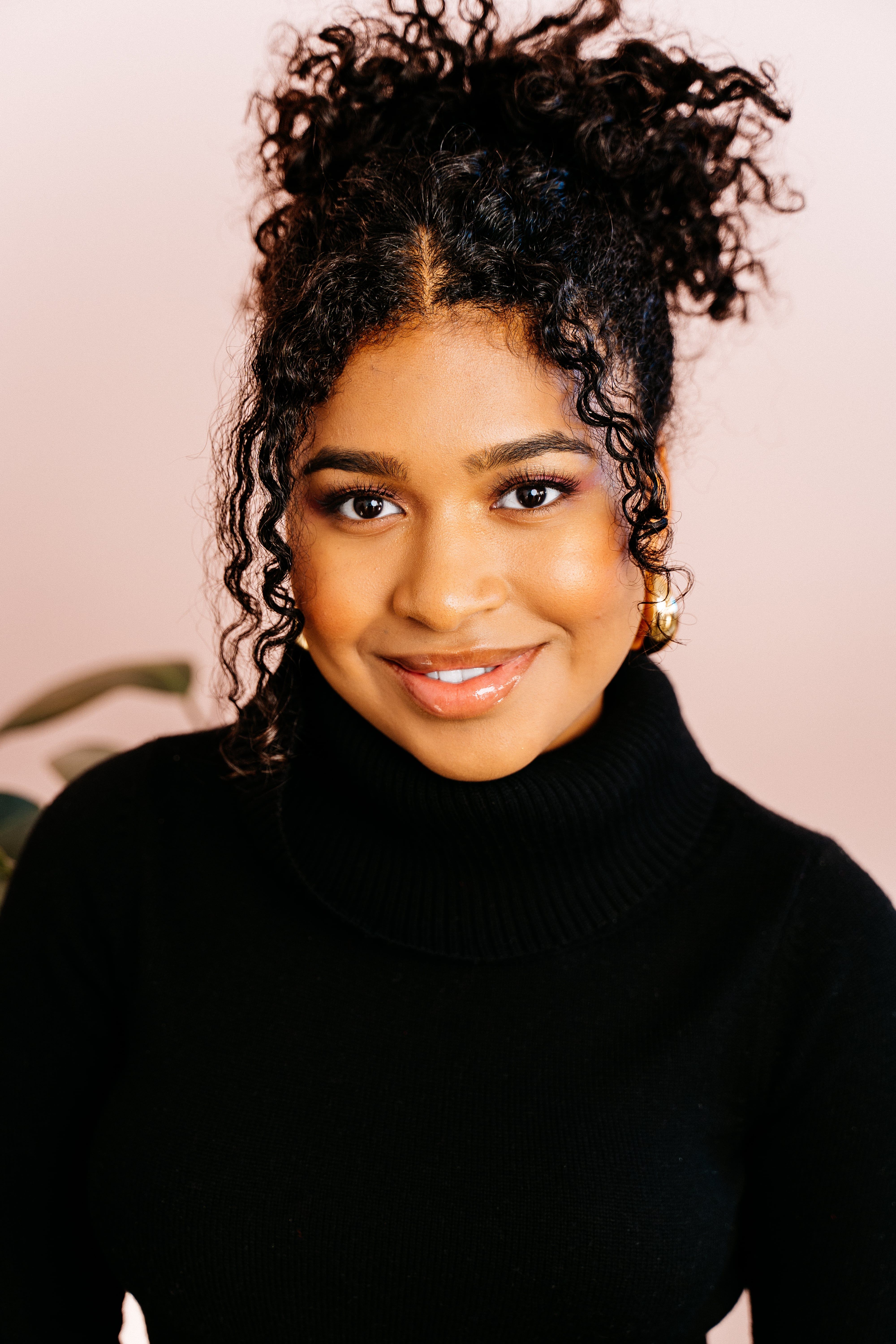 Portrait of Smiling Woman with Curly Hair · Free Stock Photo