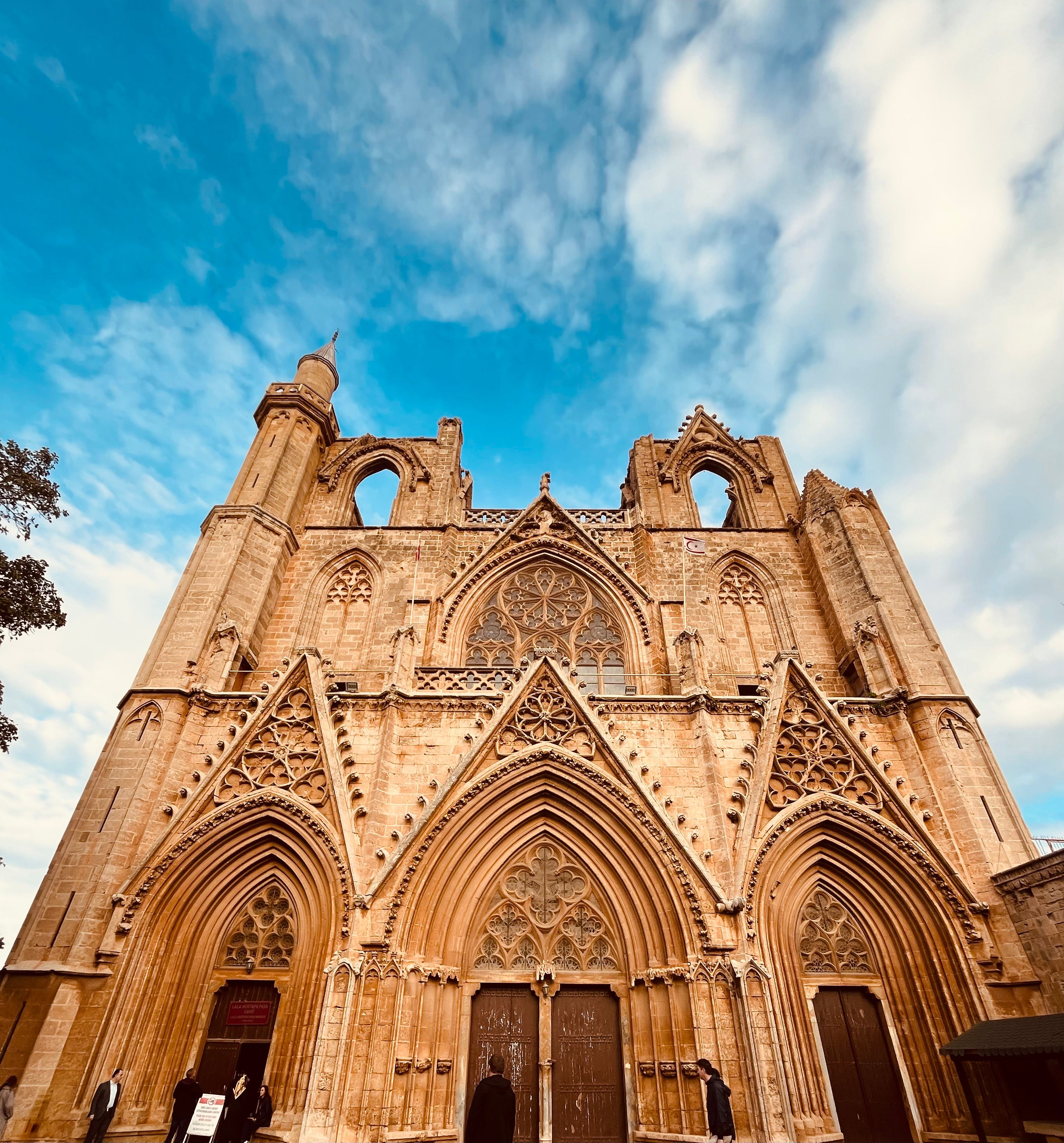 Stunning Gothic Cathedral Facade under Blue Sky · Free Stock Photo