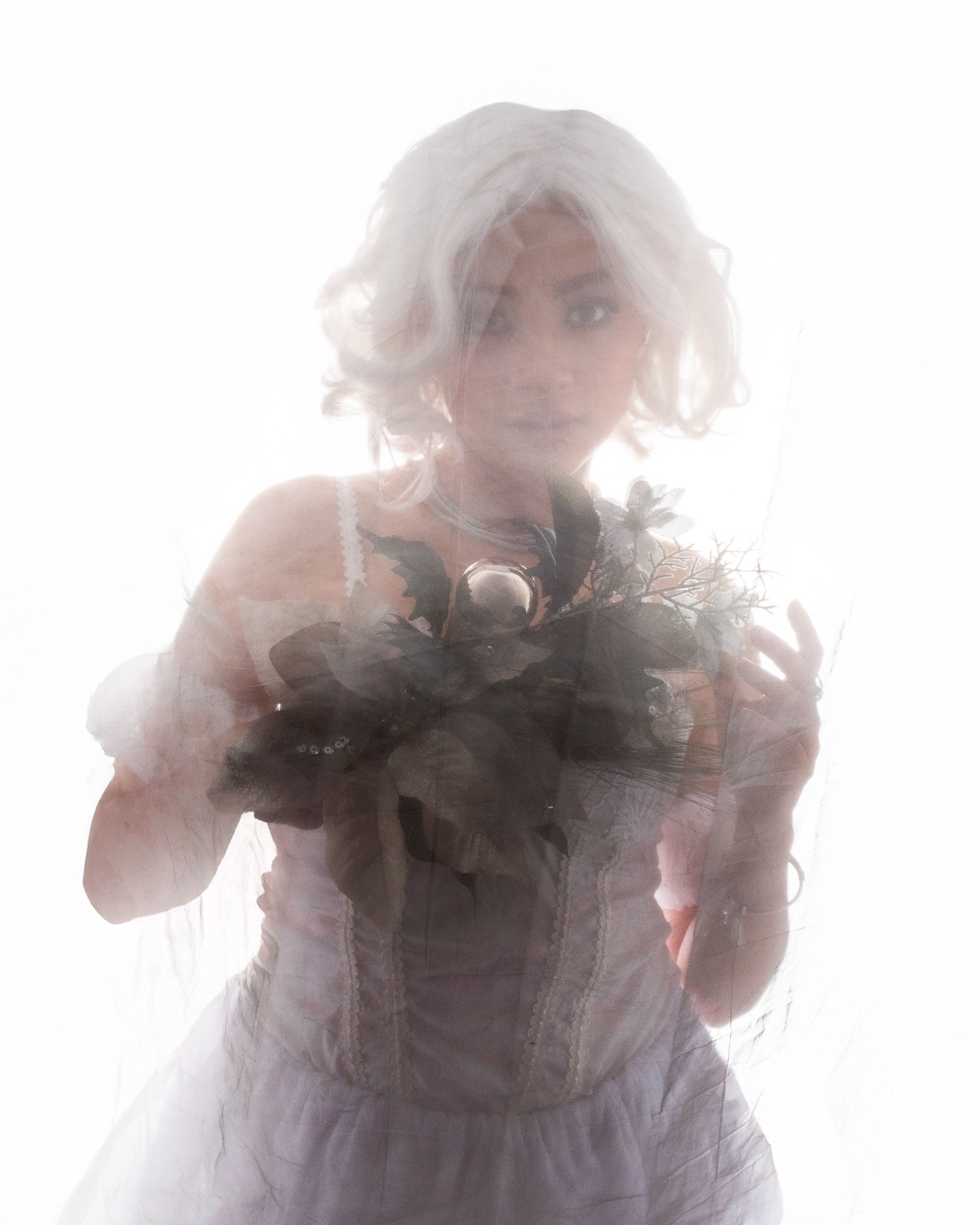 Ethereal Portrait of a Woman in a Veil · Free Stock Photo