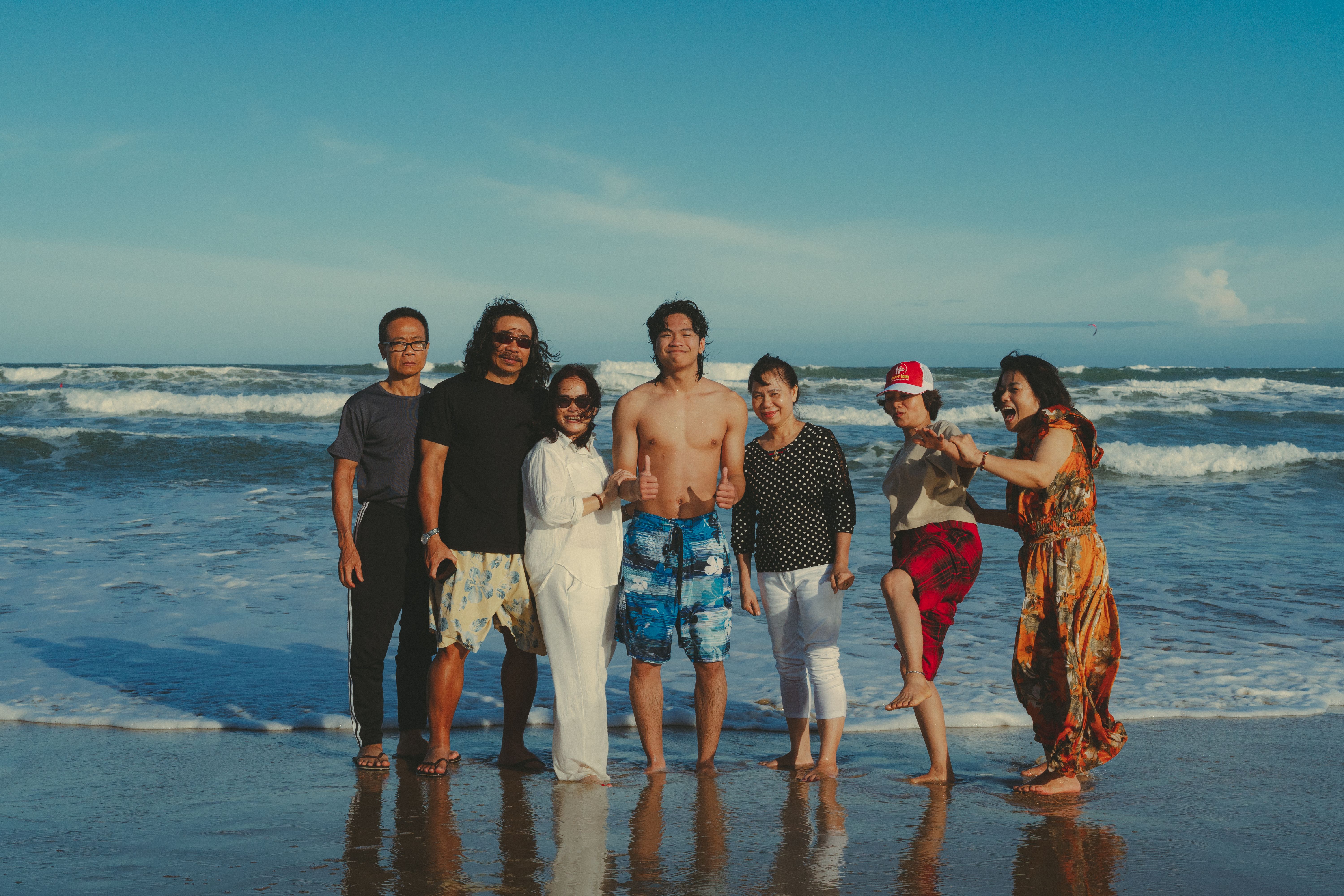 Mixed Generational Asian Family Enjoying Beach · Free Stock Photo