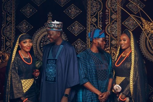 Free Elegant Nigerian couples in traditional attire at a festive ceremony. Stock Photo