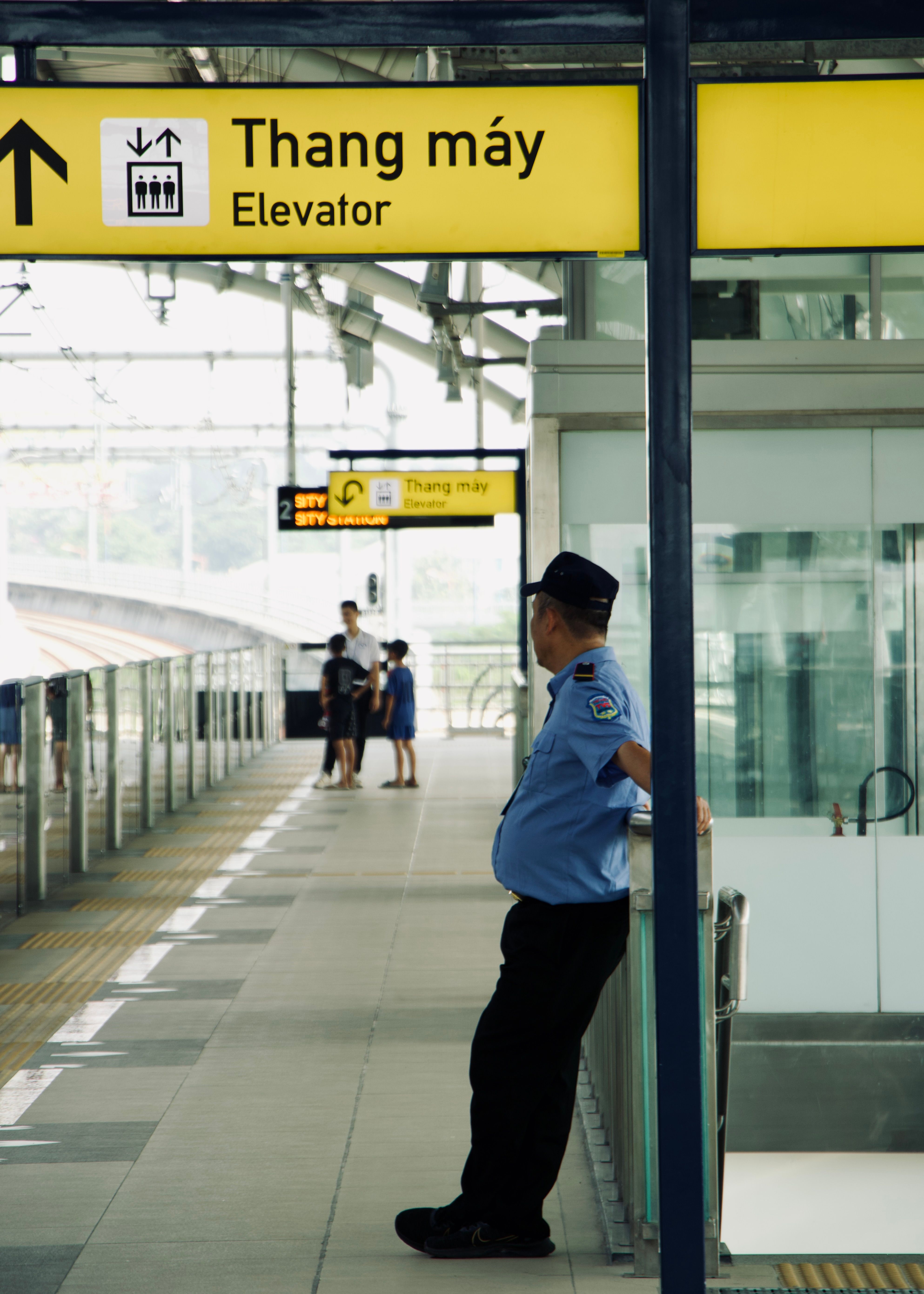 Security Guard at Metro Station Gateway · Free Stock Photo