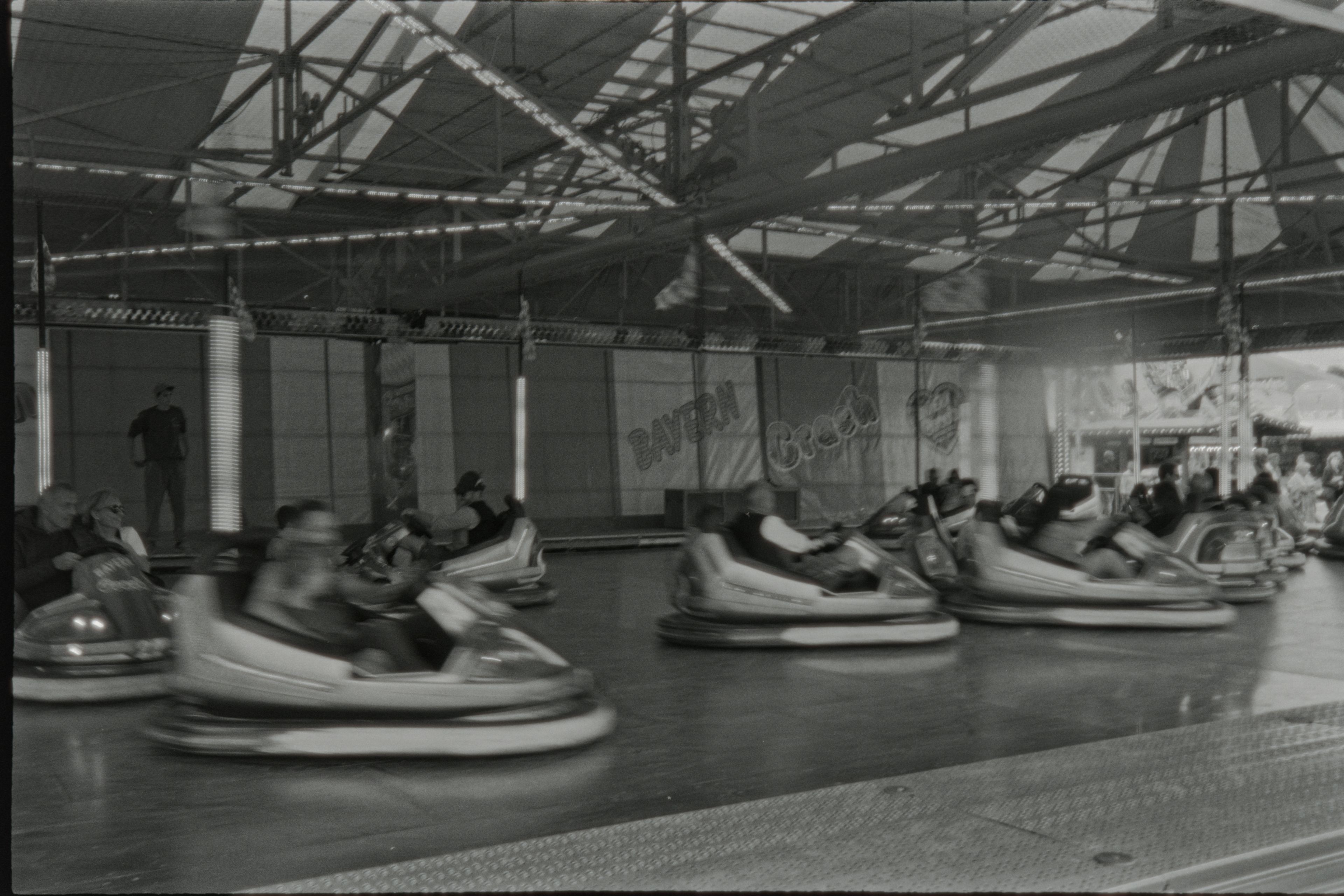 Exciting Bumper Cars Ride at German Festival · Free Stock Photo
