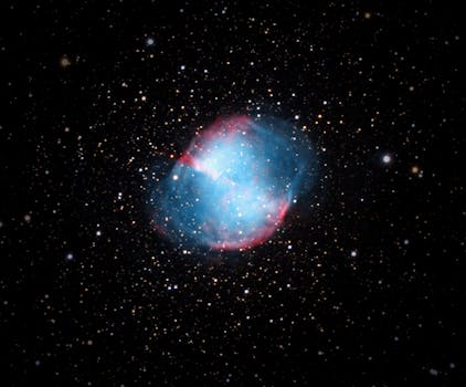 Captivating image of the Dumbbell Nebula (M27) among a myriad of stars in deep space.