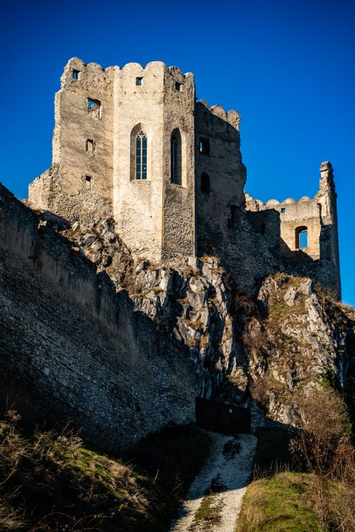Free Explore the historic Beckov Castle ruins set against a vivid blue sky in Slovakia. Stock Photo