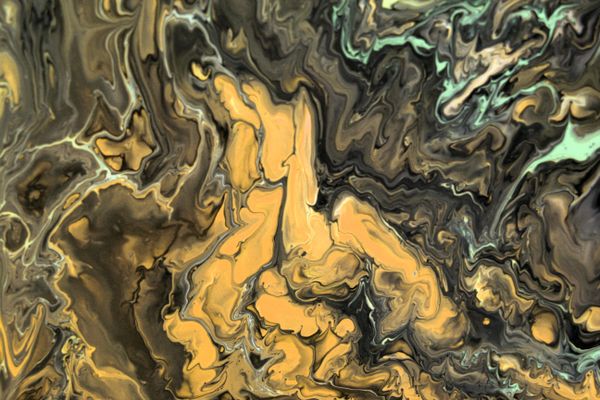 Swirling amber and black fluid-art abstract — photo by Landiva Weber on Pexels