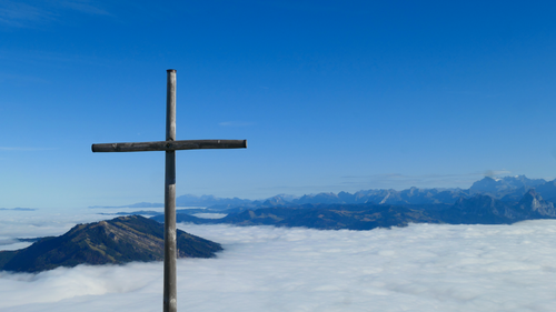 Free Breathtaking Swiss Alps view from Rigi with a wooden cross and sea of clouds. Stock Photo