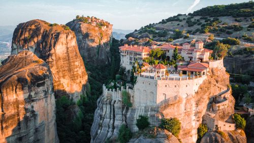 Free Breathtaking aerial view of Meteora monasteries perched on rock formations in Kalampaka, Greece. Stock Photo