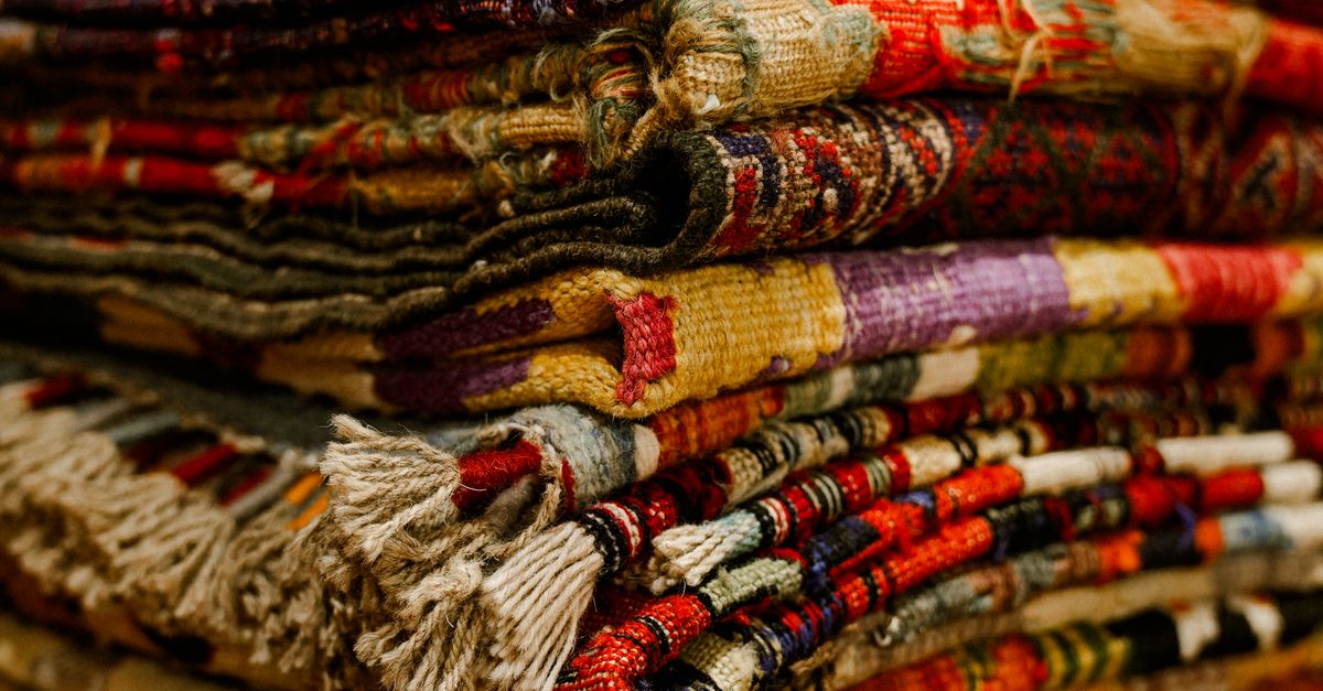 Items Using Textile Stack of Colorful Handmade Textiles · Free Stock Photo
