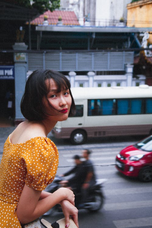 Free Shallow Focus Photo of Woman in Orange Top Stock Photo