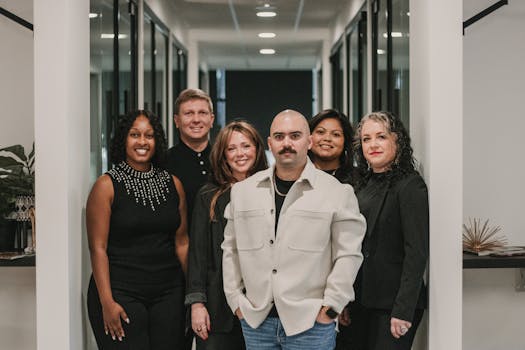 Business professionals posing in a modern office setting in Greenville, South Carolina.